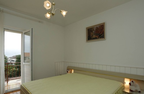 Supetar Apartment | Two bedroom apartment with balcony and sea view Supetar, Brač (A-16699-a)