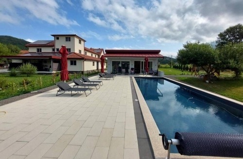 Otocac Apartment | Two bedroom apartment with a swimming pool Otočac, Velebit (A-24987-a)