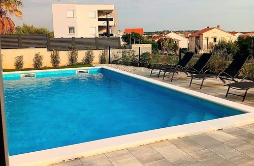 Novalja Apartment | Two-bedroom family rooms Villa Poseidon 2 with swimming pool and private balcony