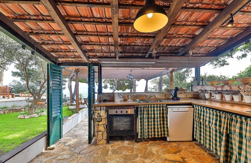 Okrug Gornji Villa | Villa Strmo - Trogir-Ciovo-waterfront villa, hot tub, boat, summer kitchen.