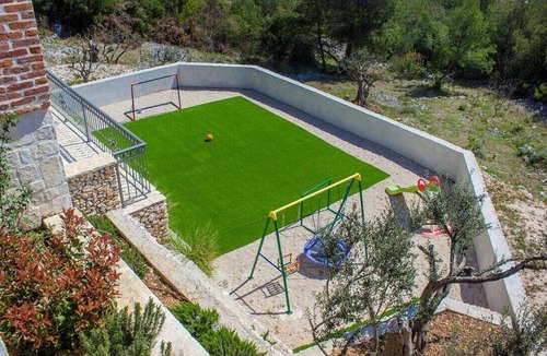Oglavci Villa | Villa Terra is luxury home - a blend of rustic exterior and modern interior.