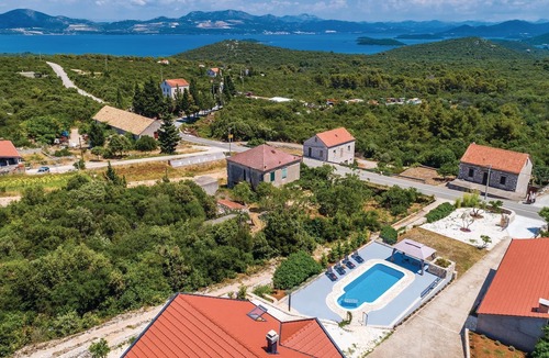 Janjina House | Your vacation can be enjoyed to the fullest in this gorgeous vacation home with pool.