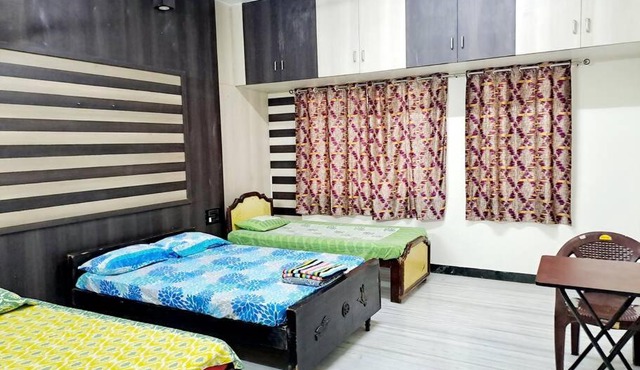5 minutes walk to Rela 7 minutes drive to Airport AC Kitchen Bedroom3 in Chennai