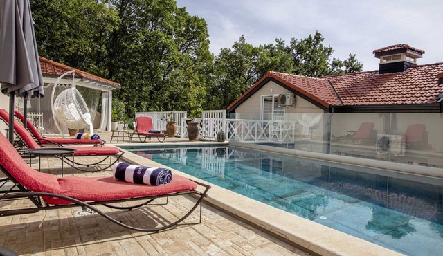 A charming holiday home in Veprinac with a swimming pool
