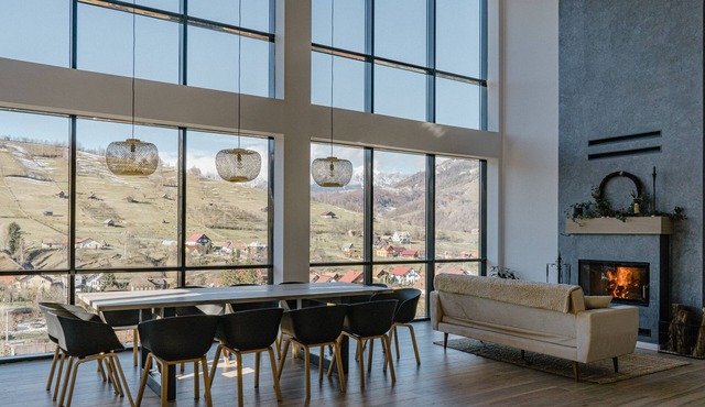A modern chalet located on a hill with an extraordinary view in Bran