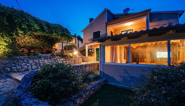 A relaxing beachside house with a hot tub overlooking the sea in Zadar County.