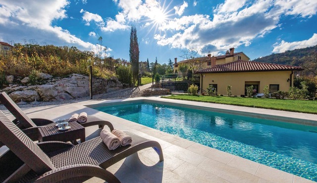 Above the Kvarner Bay, away from the city noise, is this semi-detached house.