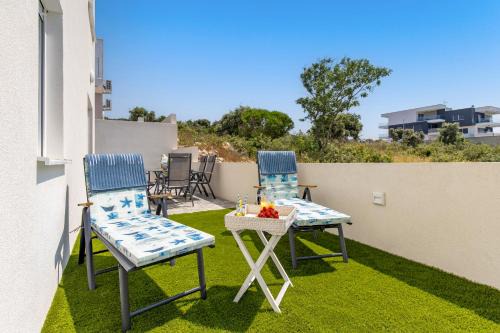 Angelika's white blue holiday home in Mandre