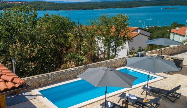 Apartment PIA with heated pool and sea view