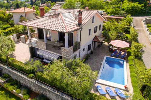 Apartments with a swimming pool Lovran, Opatija - 14196 in Lovran