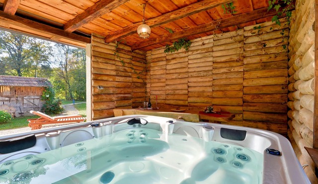 At the foot of the hill and in the shade of the forest, lies this rural cottage, furnished in old-fa