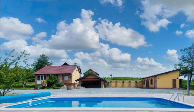 Beautiful home in Vrhovina with WiFi, Outdoor swimming pool and Heated swimming pool