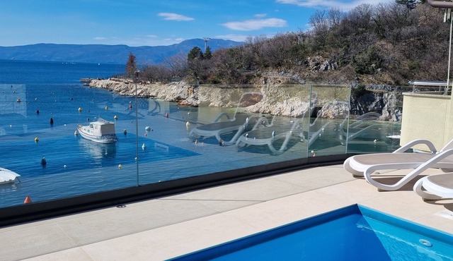 Beautiful pool villa on the beach, sleeps 8