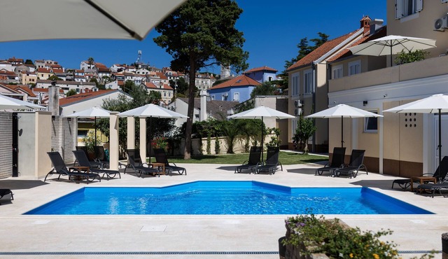 Beautiful vacation apartment in a vacation complex with private pool and garden