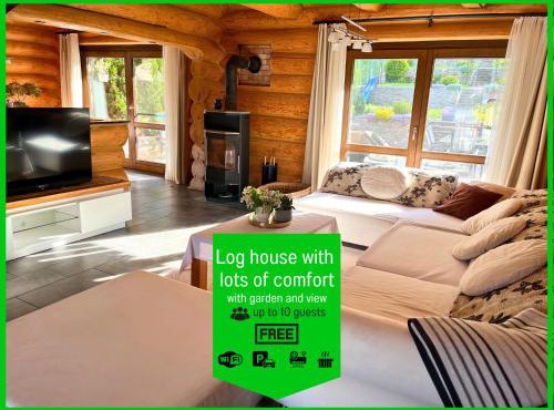 Blockhaus Malmkrog with garden, bright rooms, and an open kitchen in Laslea
