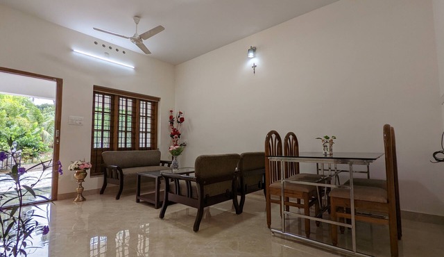 Cozy One Bedroom Villa Facing Paddy fields amidst a Fruit garden in Thrissur