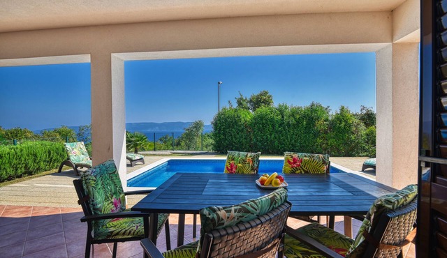 Double villa with great sea views close to the beach