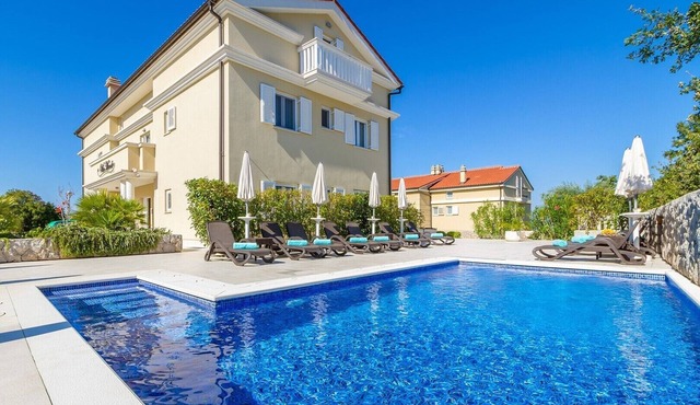 Elegant apartment Mande 1 with a terrace in villa on Krk