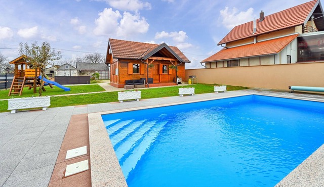 Enjoy a fantastic view of the countryside in this inviting vacation home with pool!