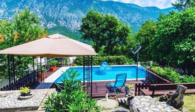 Half of the house in Tribalj with a private pool and a beautiful garden