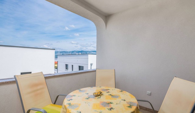 Holiday apartment with air conditioning and balcony