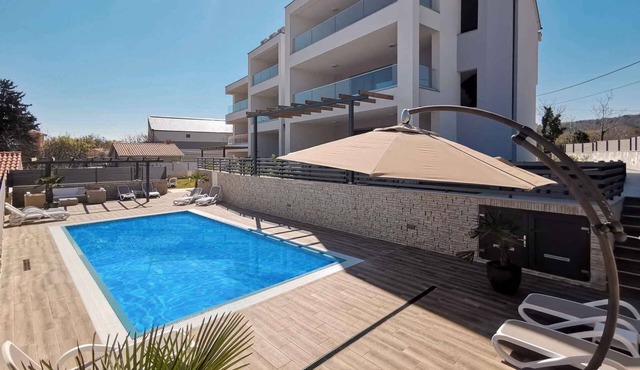 Holiday apartment with an outdoor pool