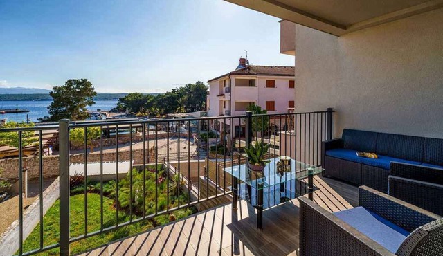 Holiday apartment with balcony and sea view
