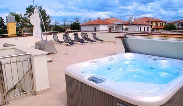 Holiday apartment with balcony and air conditioning