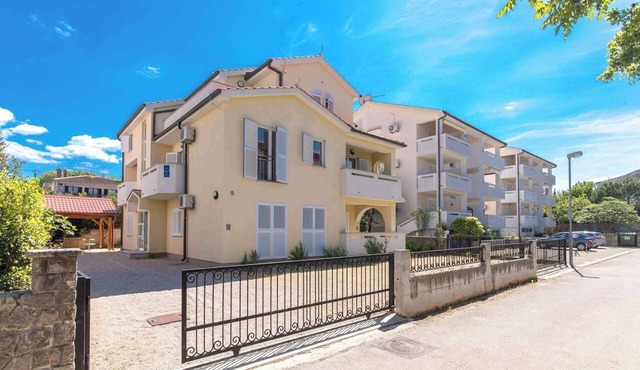 Holiday apartment with balcony and air conditioning