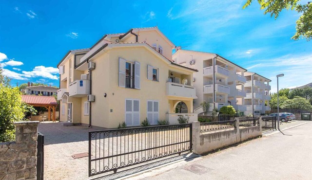 Holiday apartment with balcony and air conditioning