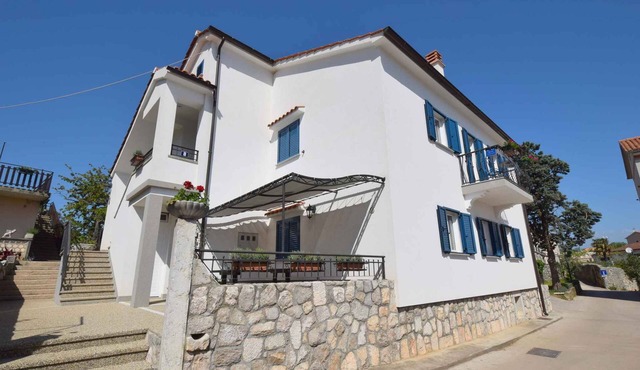 Holiday apartment with balcony and air conditioning