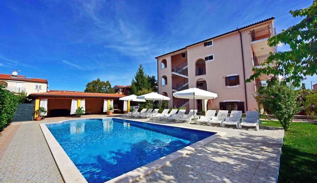Holiday apartment with balcony and pool