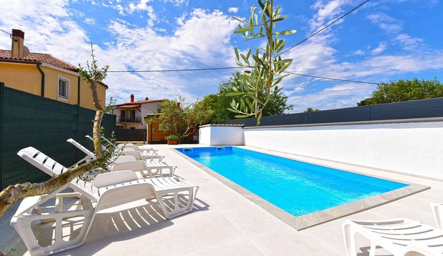 Holiday home mit Terrasse und Klimaanlage