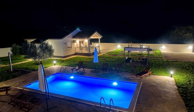 Holiday home Relax with swimming pool