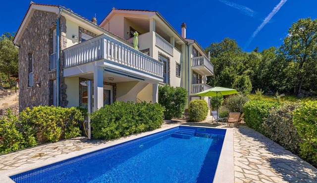 Holiday home RESIDENCIA LA FAMIGLIA with heated pool