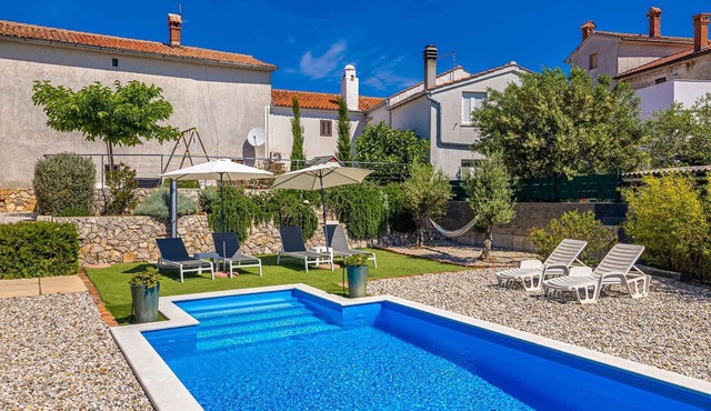 Holiday home with private swimming pool