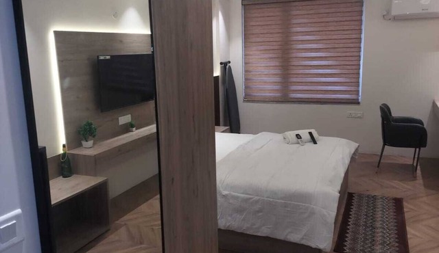 Luxury spacious rooms in central city opp. metro station 5 min from Pari Chowk in greater noida