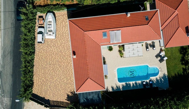 Luxury Villa with Heated Pool, Terrace, and Outdoor Amenities for Relaxation - Five Bedroom Villa