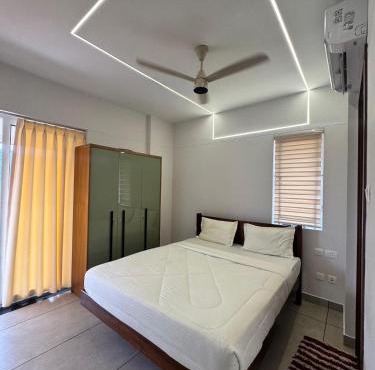 Markaz Knowledge City Homestay Near Wayanad Fully furnished Trigris Valley Hospital Land Mark Village Tower4,4E in Wayanad