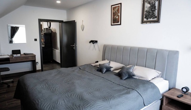 Modern apartment with yard and cycling amenities in scenic Slavonia.