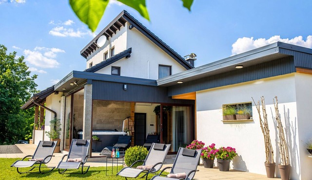 Modern home with jacuzzi, sauna, wellness and kids’ playground
