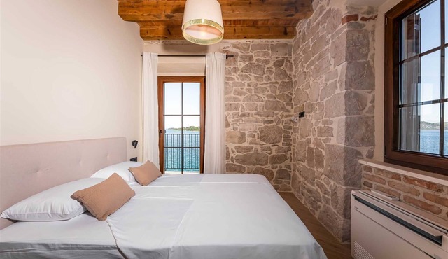 Sea front Villa Draga with heated infinity pool