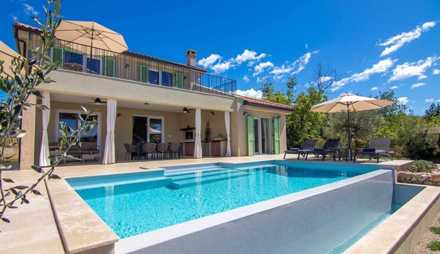 Seafront Villa Marin with a heated pool