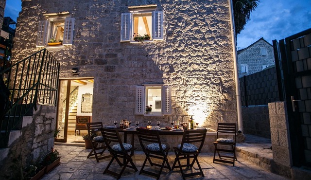 Smooth Marble and Rustic Stone at a Ciovo Island Townhouse