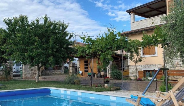 Spacious apartment Tina with a pool in Fiorini village - near the sea