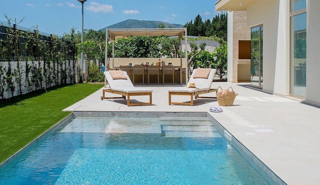 Stylish high-end home just 1,6 km from the beach featuring a heated 29 square meter pool, Table tennis,
