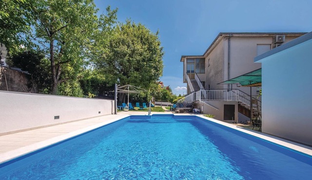 This attractive apartment is located in Kostrena, right by the sea and also not far from Crikvenica.