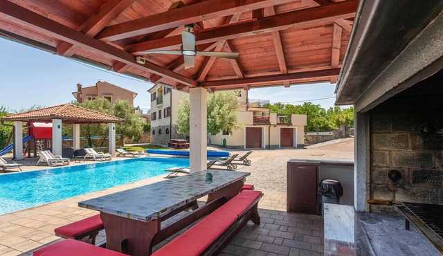 This charming vacation home is located in a small village in the middle of the island of Krk.