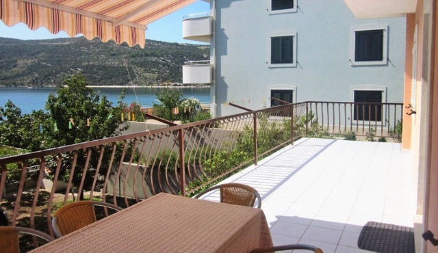 Three bedroom apartment with terrace and sea view Marina, Trogir (A-6116-c)
