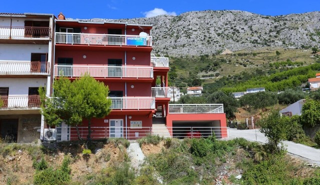 Three bedroom apartment with balcony and sea view Stanići, Omiš (A-10324-c)